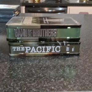 Hbo original - "Band of Brothers" and  "The Pacific" entire series in nice tin.